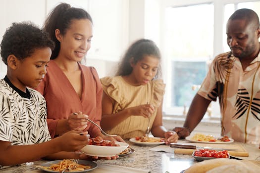 A happy family sharing a meal at home, emphasizing love and togetherness.